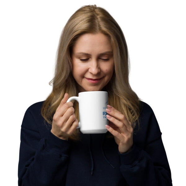 woman sipping out of RTF mug